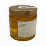 Bienenprodukte Shop Akazienhonig im 500g Glas mit goldenem Deckel und hellem, flüssigem Honig
