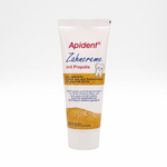 Bienenprodukte Shop APIDENT Zahncreme mit Propolis in weißer Tube mit Wabenmuster für die tägliche Mundpflege