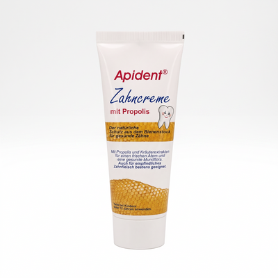 Bienenprodukte Shop APIDENT Zahncreme mit Propolis in weißer Tube mit Wabenmuster für die tägliche Mundpflege