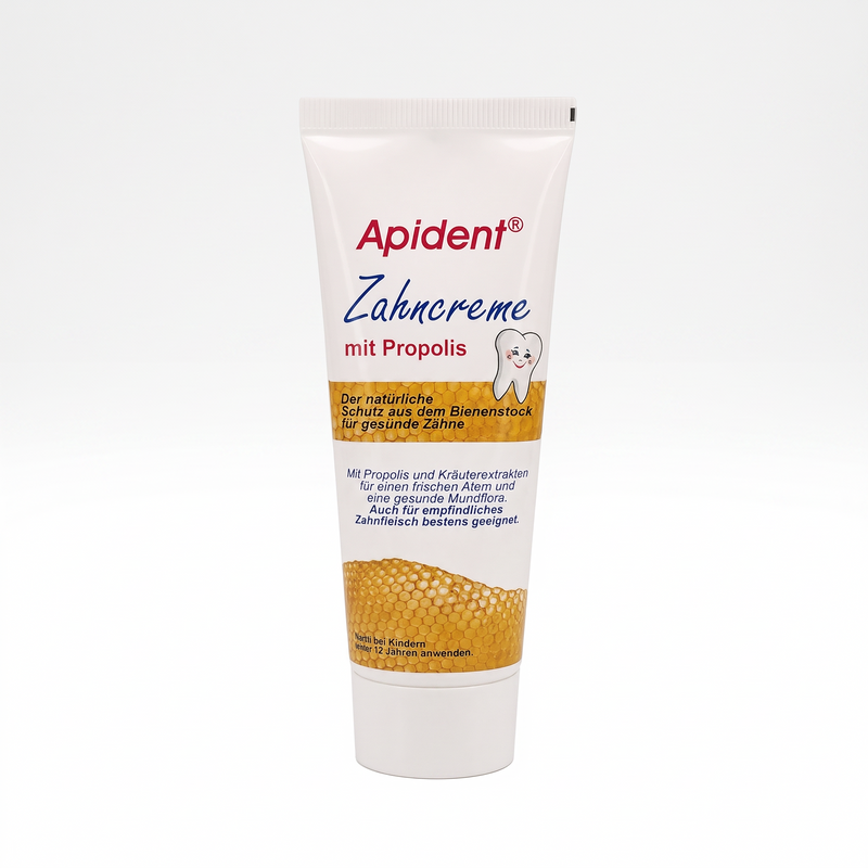 Bienenprodukte Shop APIDENT Zahncreme mit Propolis in weißer Tube mit Wabenmuster für die tägliche Mundpflege