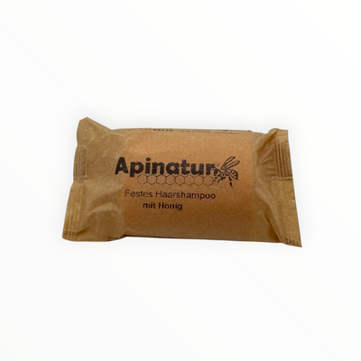 Bienenprodukte Shop Apinatur festes Shampoo mit Honig in nachhaltiger Papierverpackung